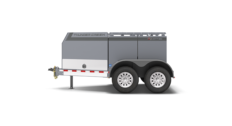 Multi fuel tank trailer, the No HAZMAT Fuel and Service Trailer fits 460 gallons of liquid parked in side view